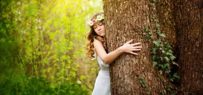 850_400_young-woman-hugging-a-tree_1491499697